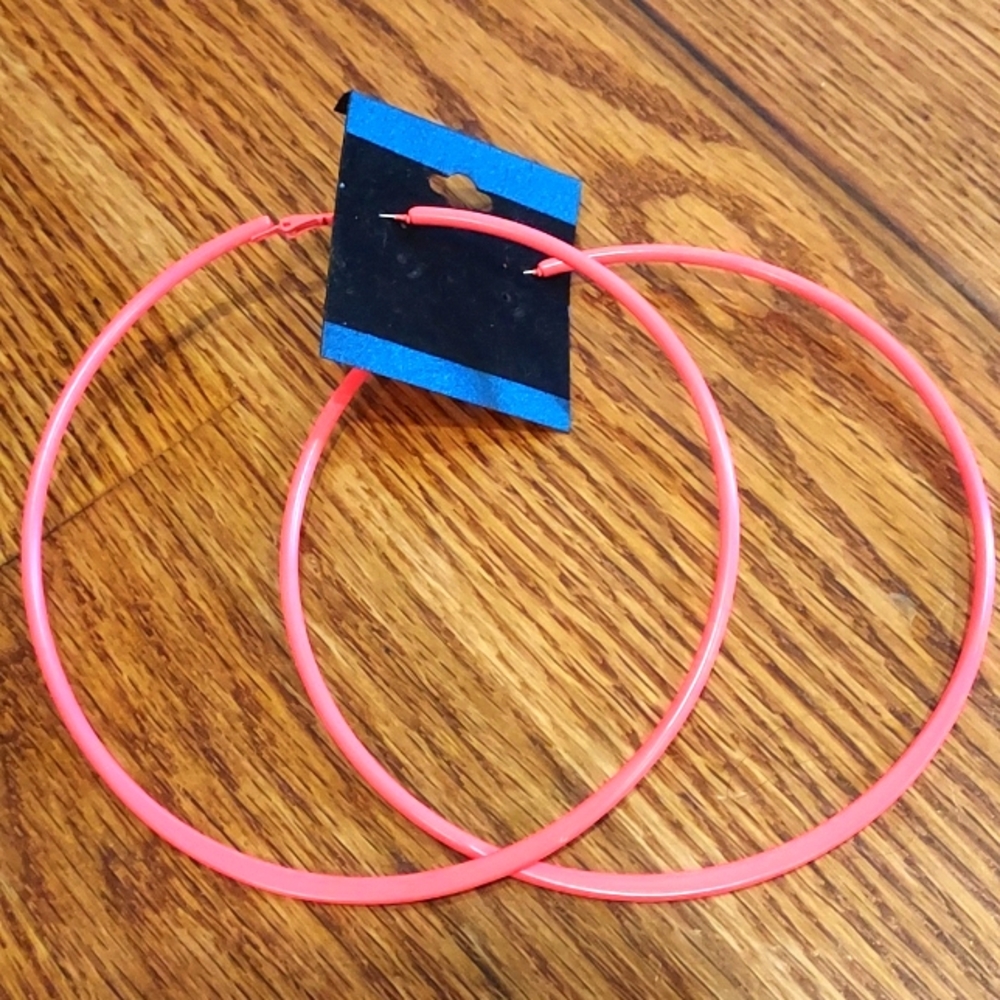 Huge neon pink hoop earrings